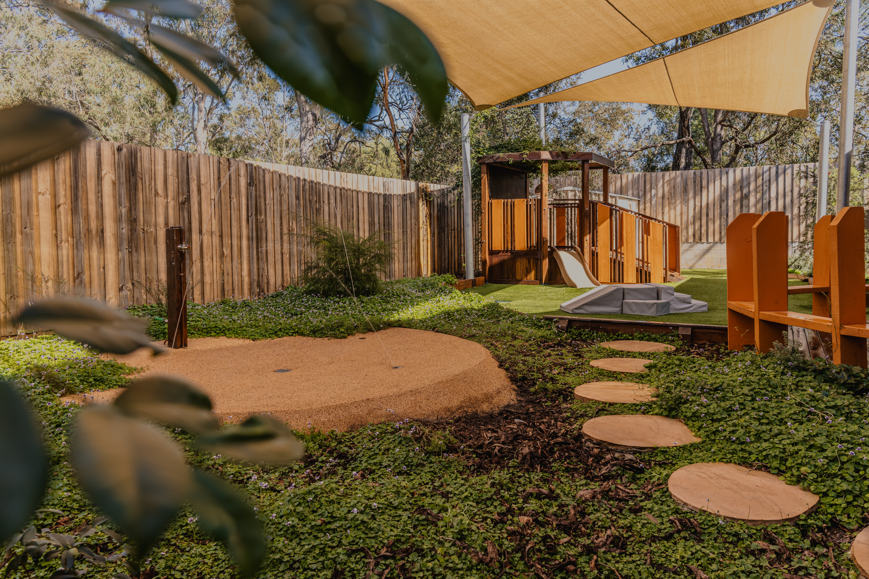 Babies yard play structure with slide and stepping stones