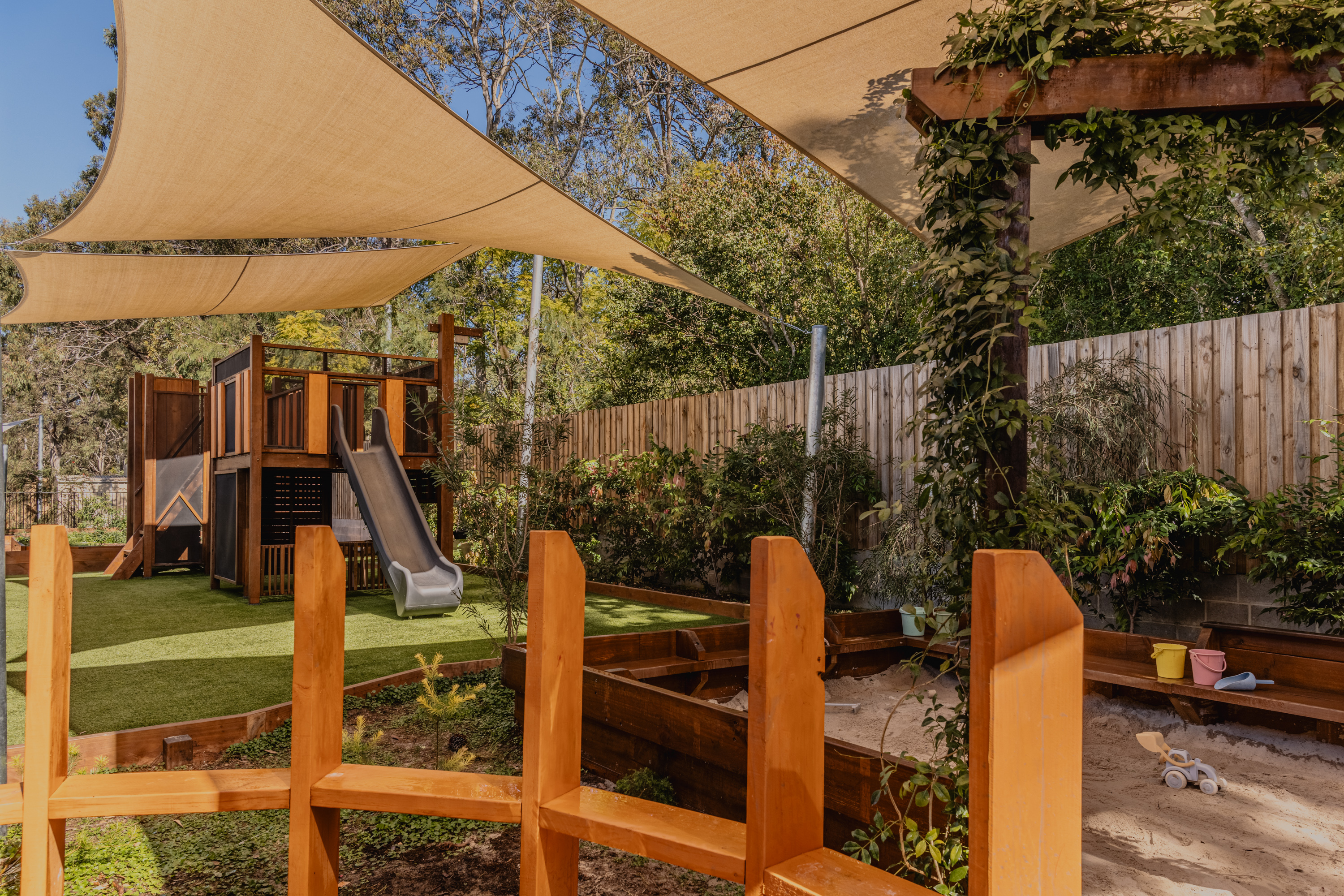 Timber fort with sandpit in foreground