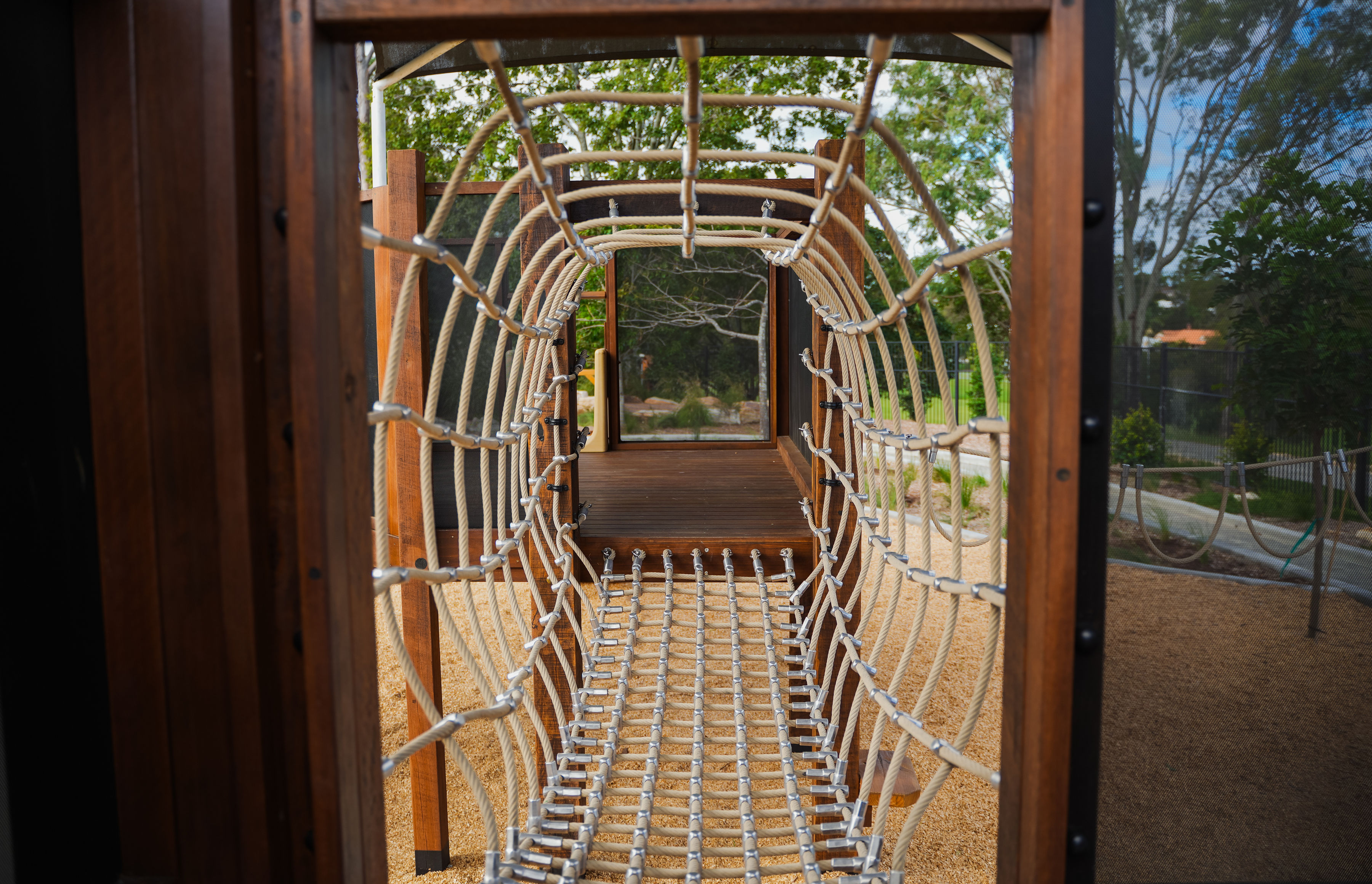 Rope tunnel leading to the elevated play deck