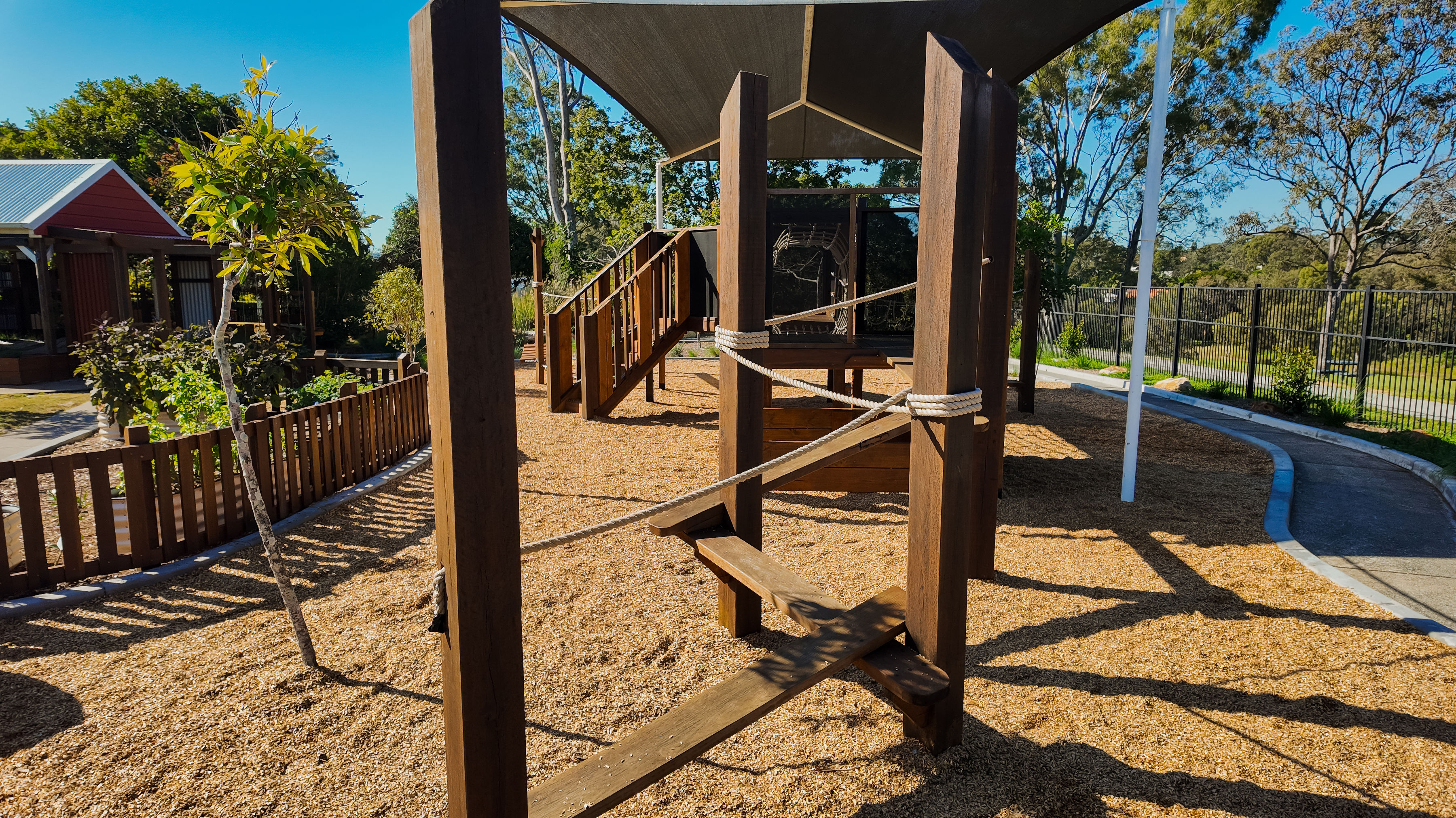 Crossing the rope bridge inside the play tower