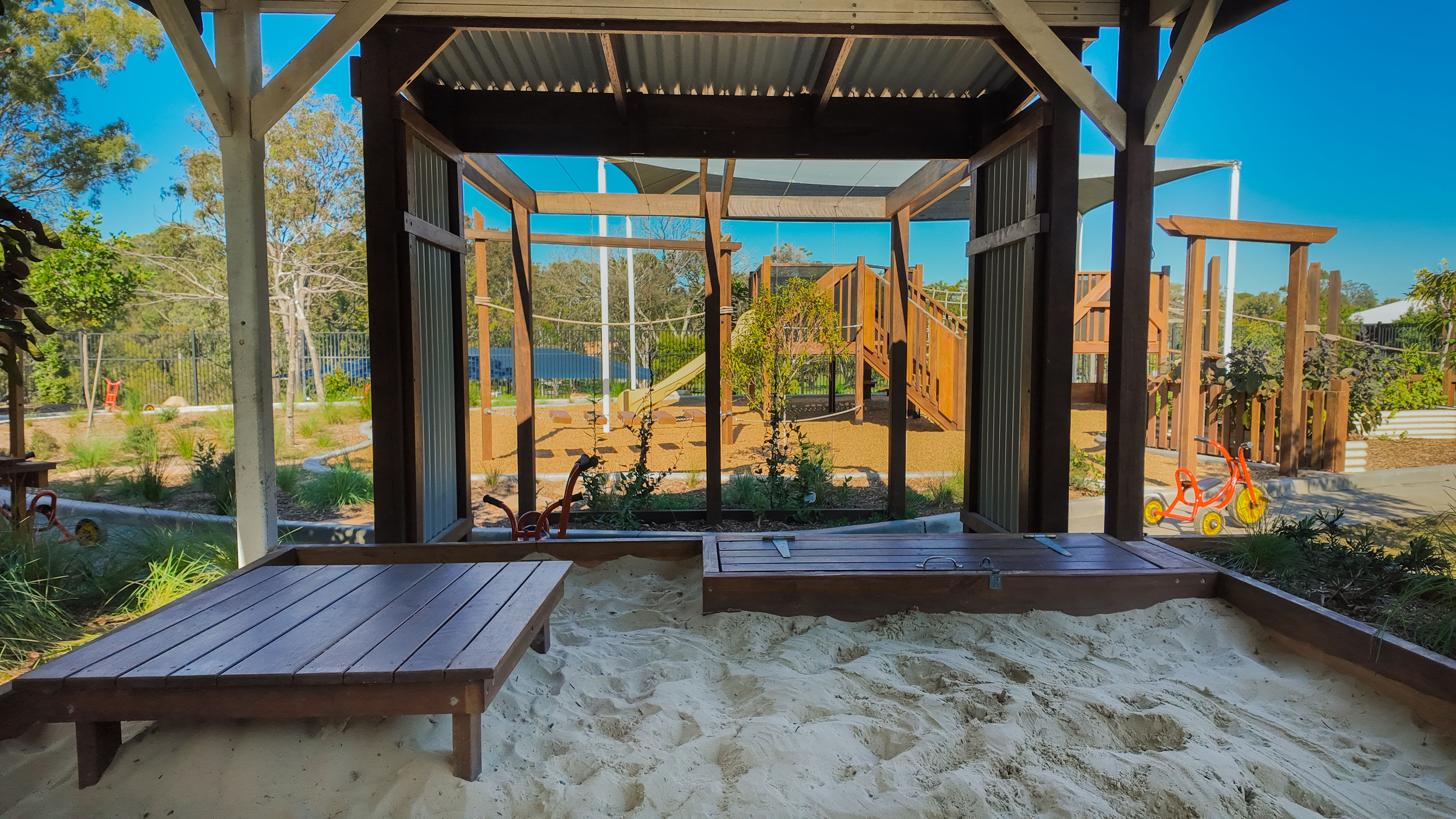 Looking out from the gazebo across the sand play and play tower