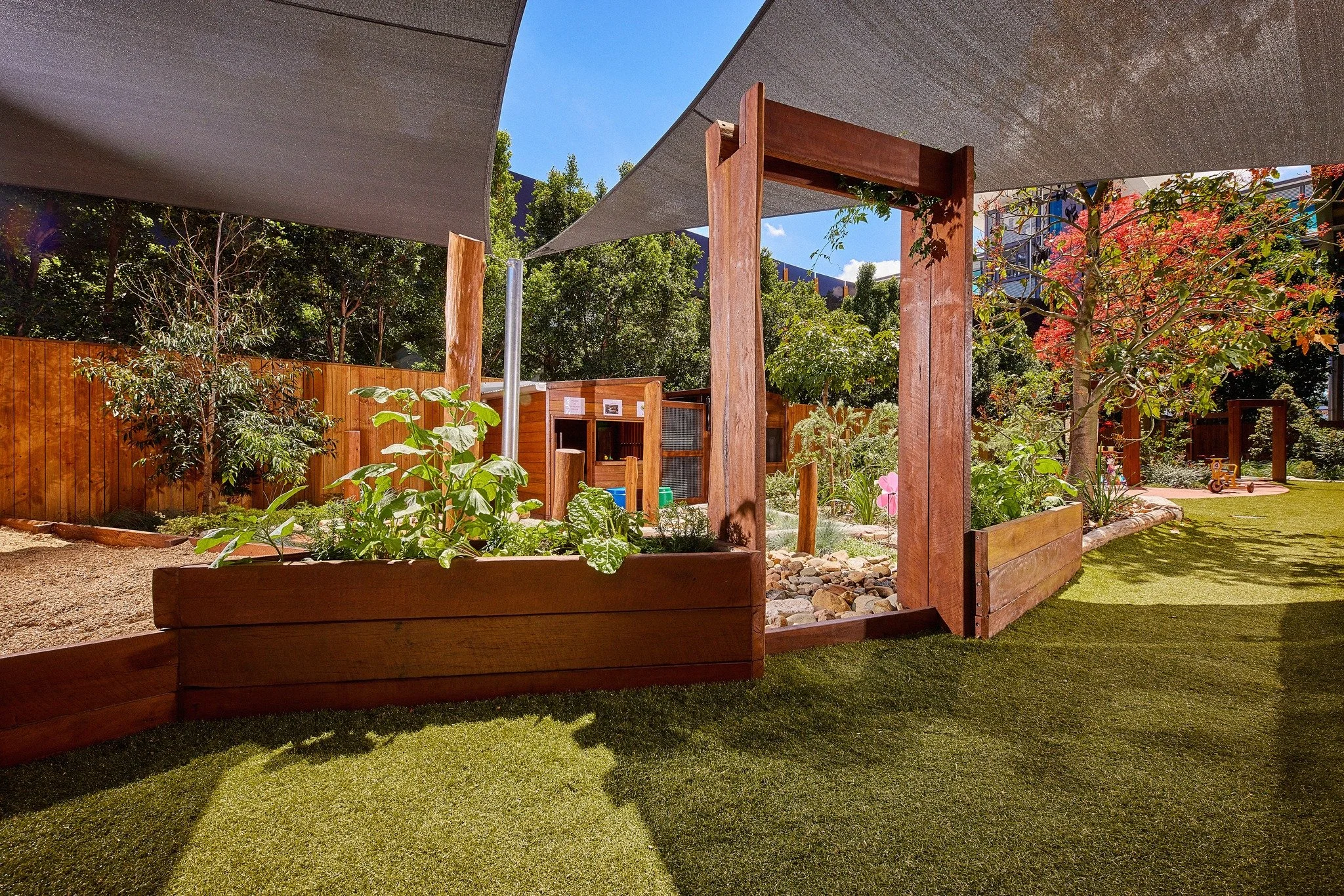 A child engaged in confident, exploratory outdoor play