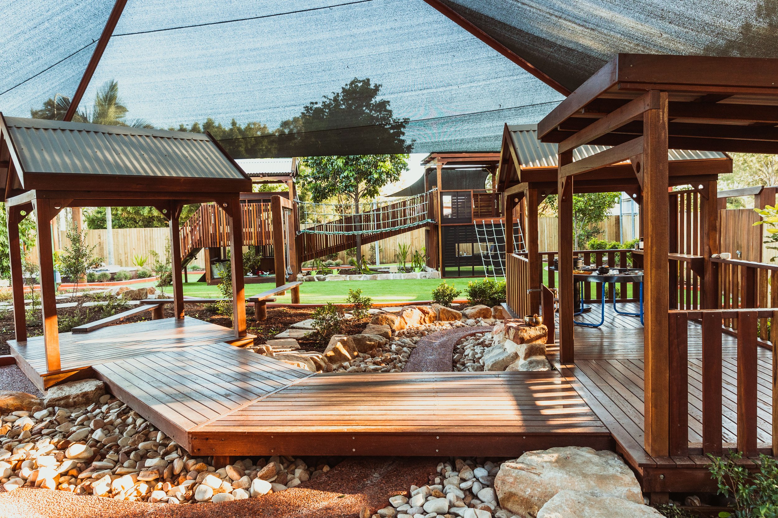 Children engaged in physical, effortful play in a natural outdoor environment